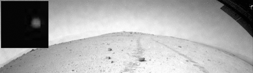 Phobos' shadow darkens Mars