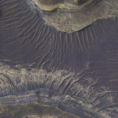 Layered rocks northeast of Hellas basin