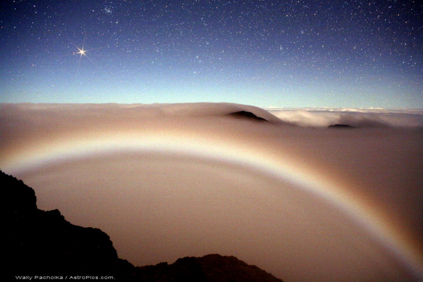 Mars rising over moonbow in Haleakala Crater in Maui