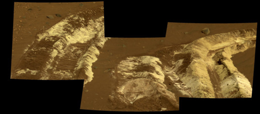 Spirit's dragging wheel digs up bright soil
