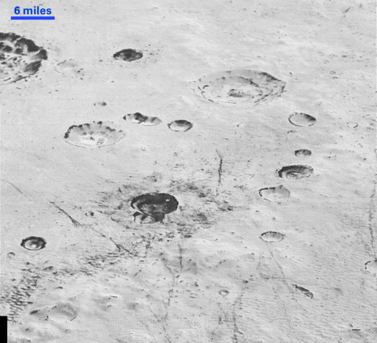 Pluto's layered craters and icy plains