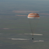Soyuz sinks toward landing
