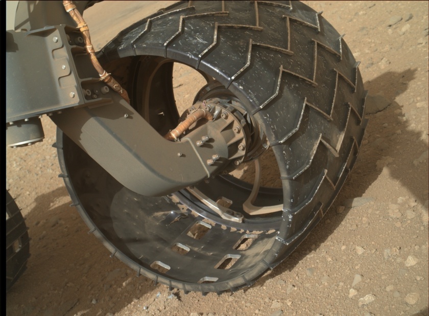 Curiosity's left front wheel, sol 411