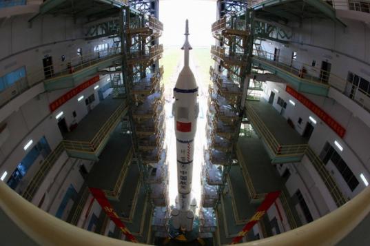 Shenzhou-9 rolls out