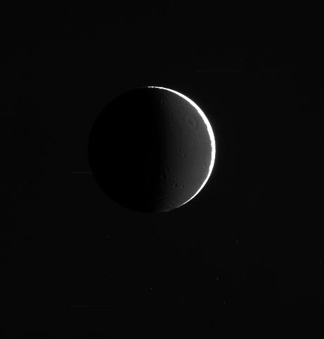 Dione half-lit by Saturnshine
