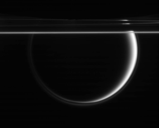 Enceladus, Titan, and the rings of Saturn