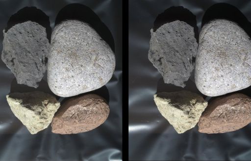Crossed-eye stereo view of some rounded rocks from MAHLI