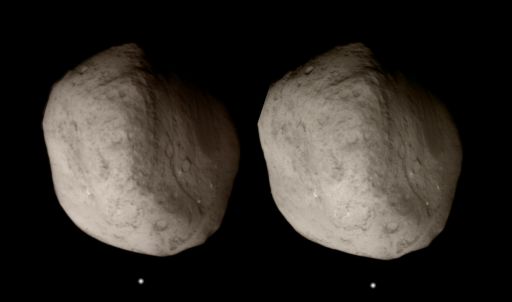 Crossed-eye stereo view of Tempel 1 from Stardust