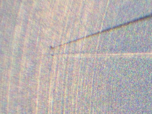 Microscopic particle within the Hayabusa sample return capsule