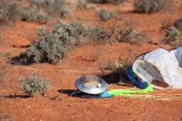 Hayabusa's sample return capsule sitting on the ground