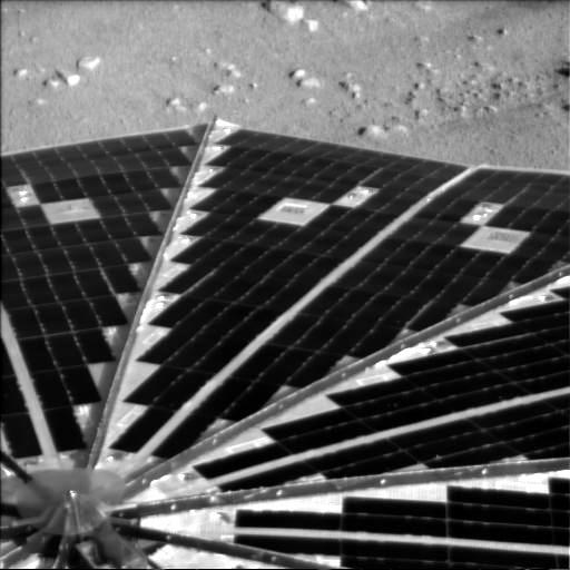 Phoeix solar panel against Martian soil