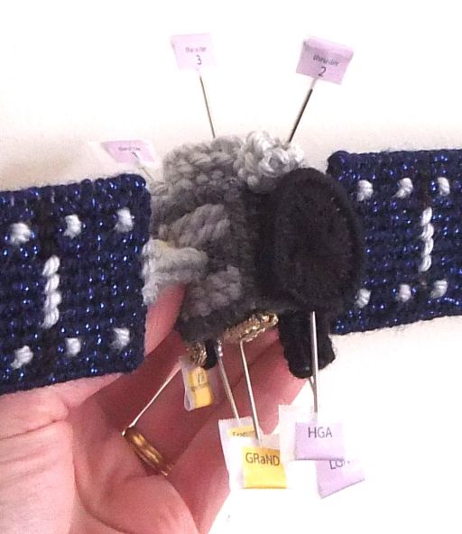 Dawn, in plastic canvas, parts labeled