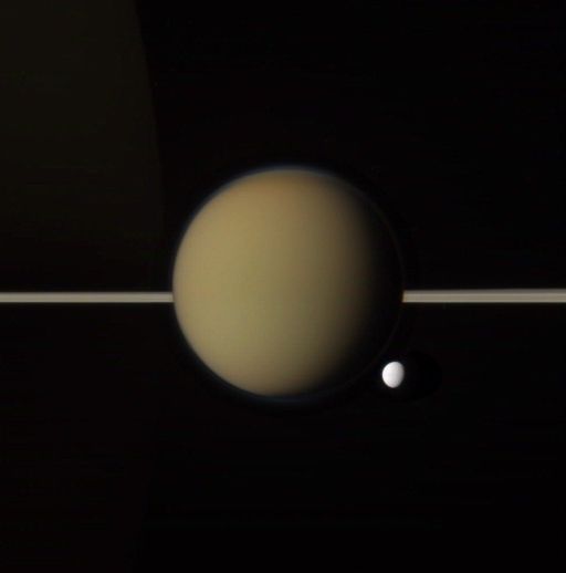 Titan, Tethys, rings, and ringlit Saturn