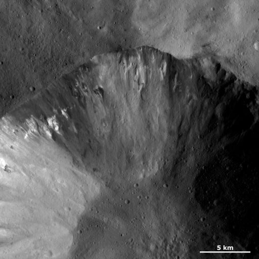 Dark and bright material in a crater wall