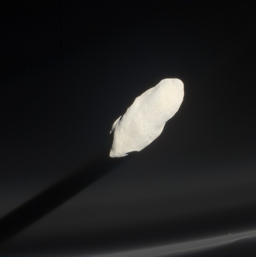 Color global view of Prometheus casting shadow on the F ring