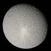 Rhea in natural color, featuring Inktomi crater