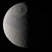 Global color view of a half-phase Tethys, with prominent Odysseus basin