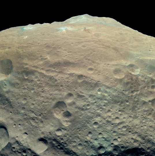 Enhanced-color view of Vesta's southern mountain