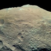 Enhanced-color view of Vesta's southern mountain