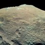 Enhanced-color view of Vesta's southern mountain