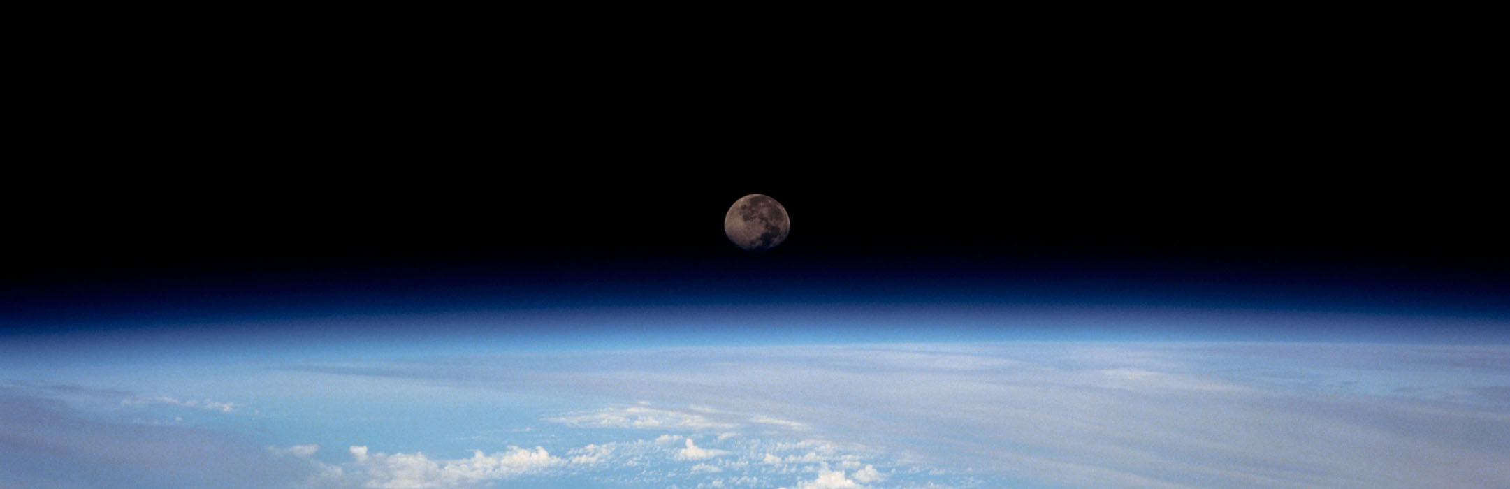 Moon over Earth from the International Space Station