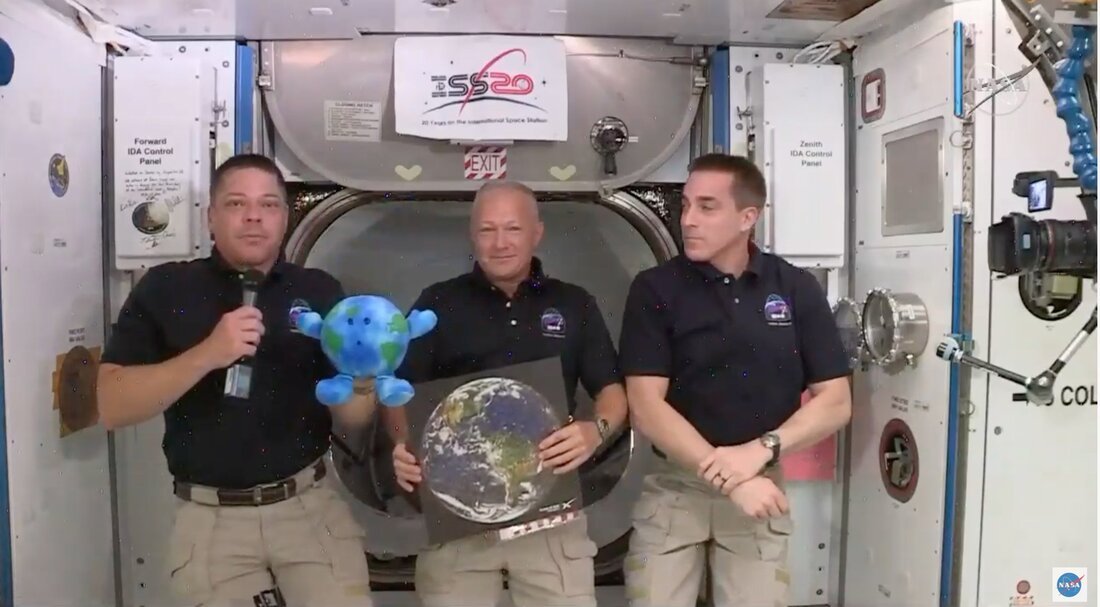 Little Earth Buddy on ISS held by Bob Behnken