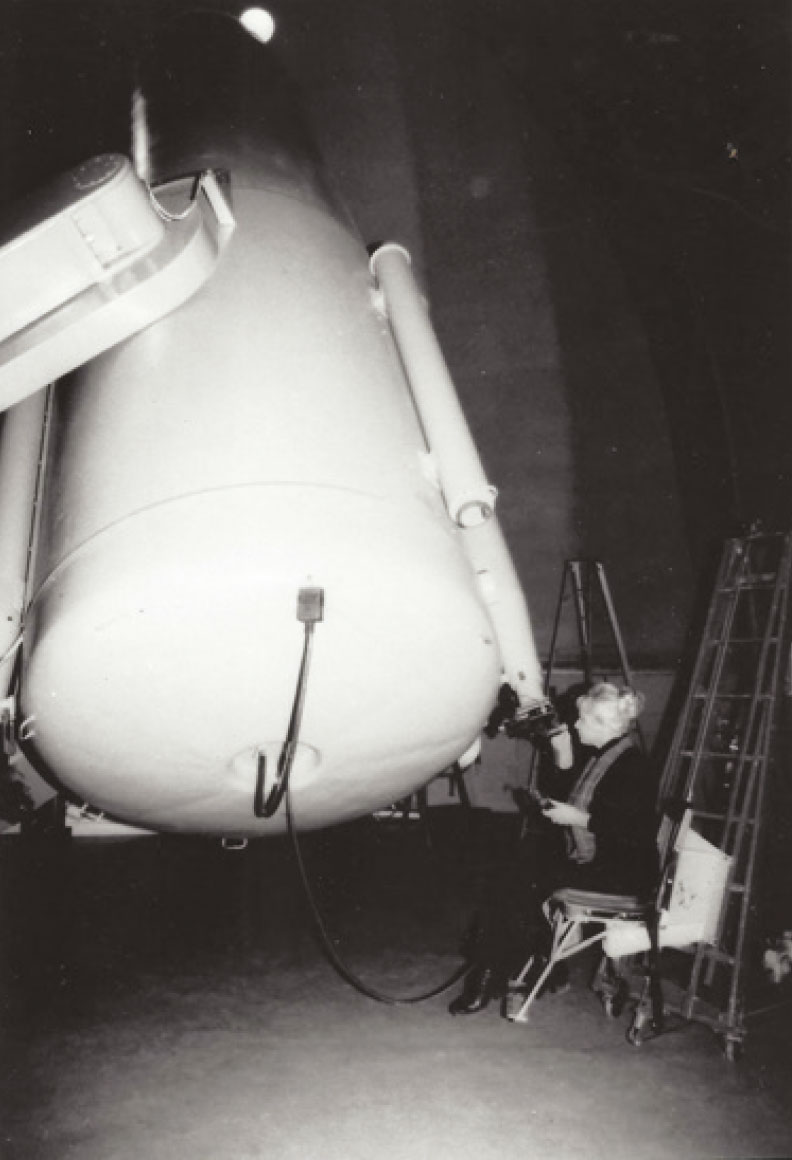 looking through telescope