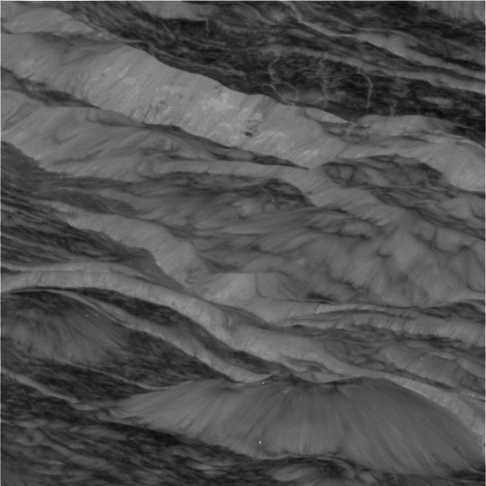 Dione's scarps and slopes