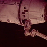 Dragon grappled by Canadarm 2