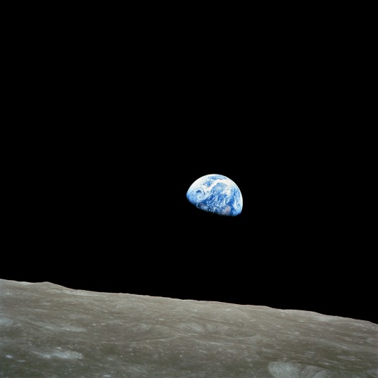 Earthrise over the lunar horizon from Apollo 8