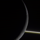 Crescent Enceladus with rings