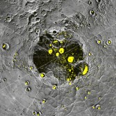 Arecibo's bright pixels fall in permanently shadowed craters