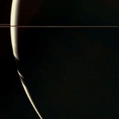 Nearly behind Saturn