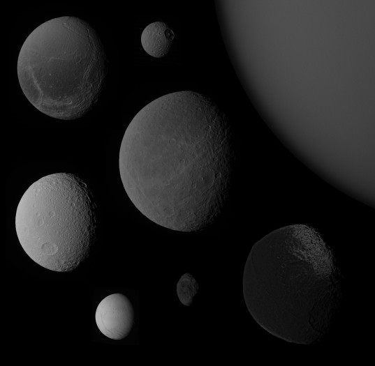 Saturn's moons at a common phase angle and a common scale
