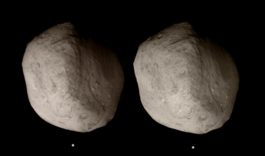 Crossed-eye stereo view of Tempel 1 from Stardust