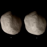 Crossed-eye stereo view of Tempel 1 from Stardust