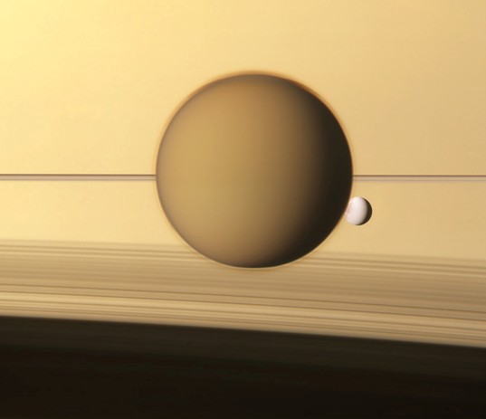 Titan and Dione with Saturn and rings