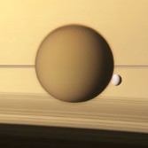 Titan and Dione with Saturn and rings