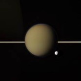 Titan, Tethys, rings, and ringlit Saturn