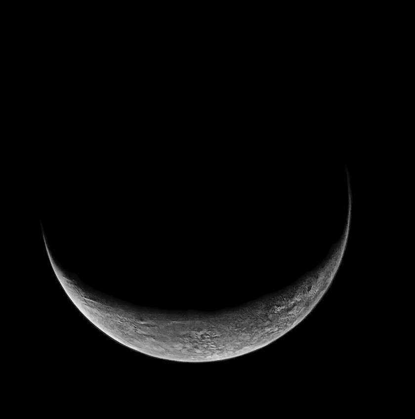 Triton's crescent in color (high-pass filtered)