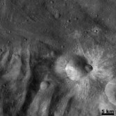 Fresh crater on the rim of Tuccia