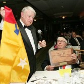Bruce Murray awards to Ray Bradbury the Mars flag as part of the Thomas O. Paine award for the Advancement of Human Exploration of Mars at The Planetary Society's 25th Anniversary Awards Dinner, November 12, 2005.