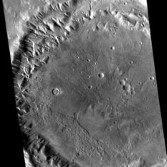 A Mars Reconnaissance Orbiter Context Camera (CTX) image of most of a 44-kilometer-diameter crater within Tempe Terra.  The crater includes numerous examples of inverted topography.