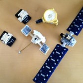 GRAIL, New Horizons, MESSENGER, and Dawn plastic canvas by Emily Lakdawalla