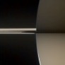 Cassini image of Saturn and Mimas, lit by ringlight, processed by Gordan Ugarkovic