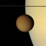 Orange Titan in front of yellow Saturn, August 1, 2007