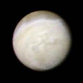 Taken on August 21, 1989, four days before Voyager 2's closest approach to Neptune, this was one of the first images to show surface features on Neptune's largest moon, Triton.