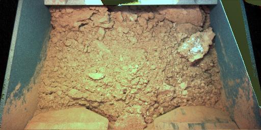Phoenix' first scientific sample of soil