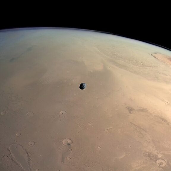 Phobos over olympus mons