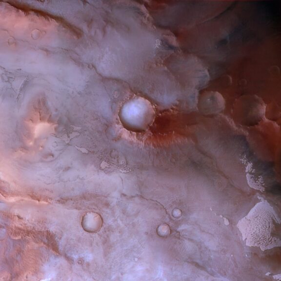 South pole of mars in pink and red